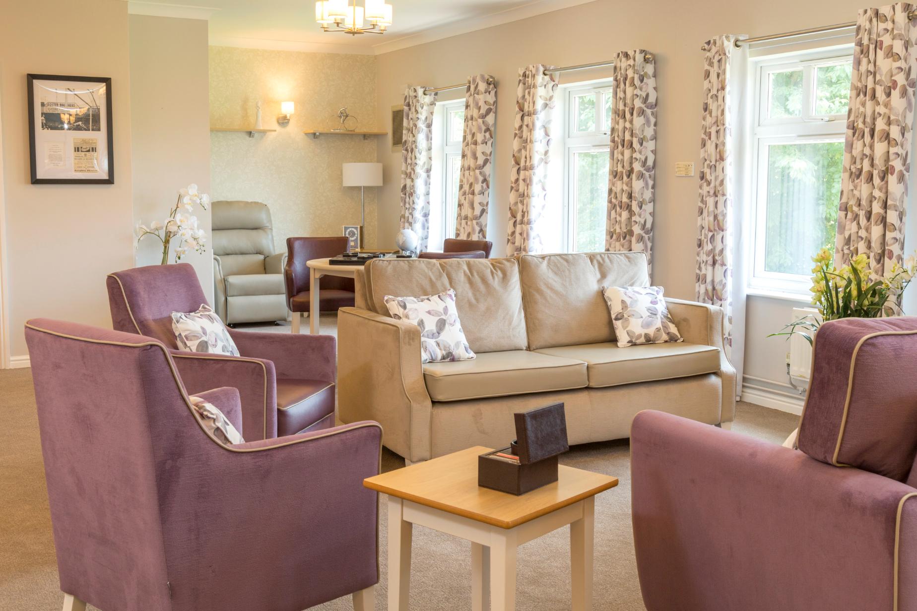 front-room-with-purple-and-cream-furniture